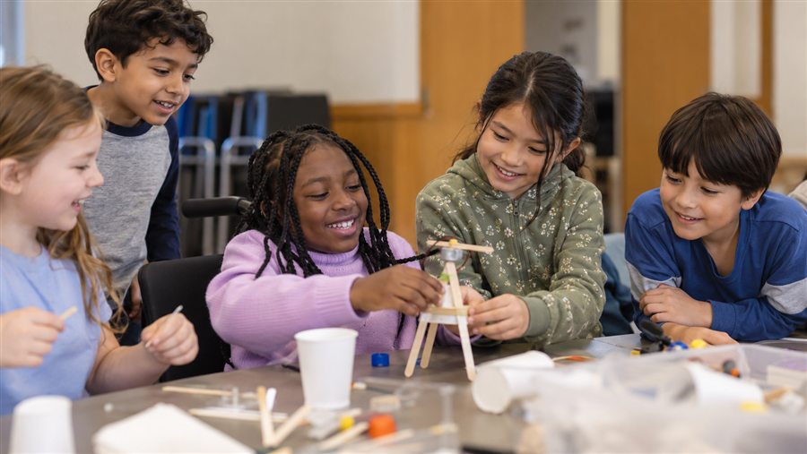 Children collaborating on a hands-on STEM project